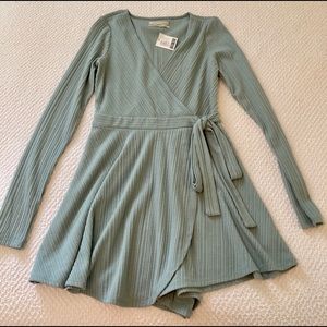 Urban Outfitters Mint green long sleeve romper.